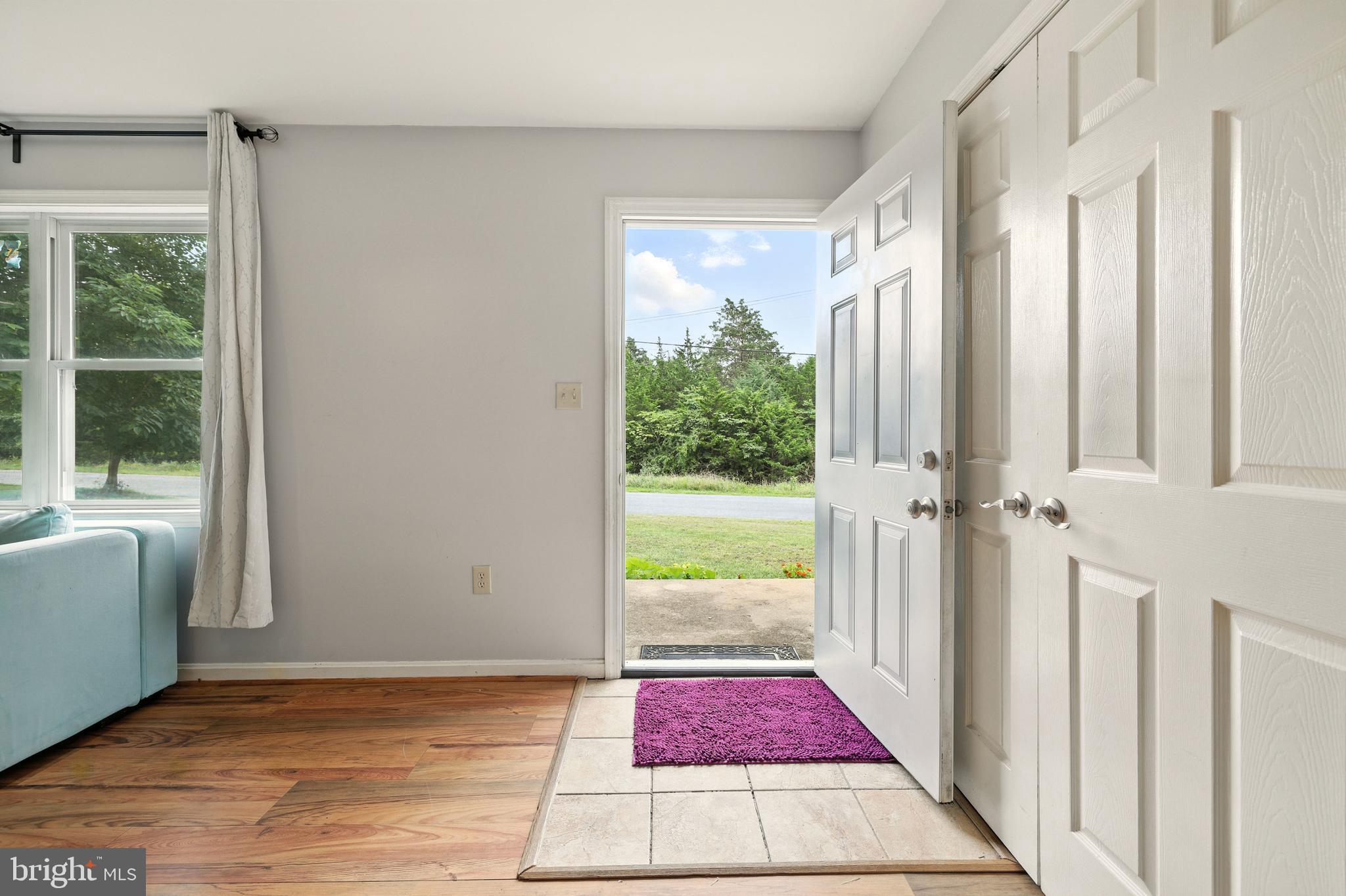 859 Colley Block Road Strasburg, VA 22657 - Photo 17 of 52 a view of a hallway with wooden floor and a rug