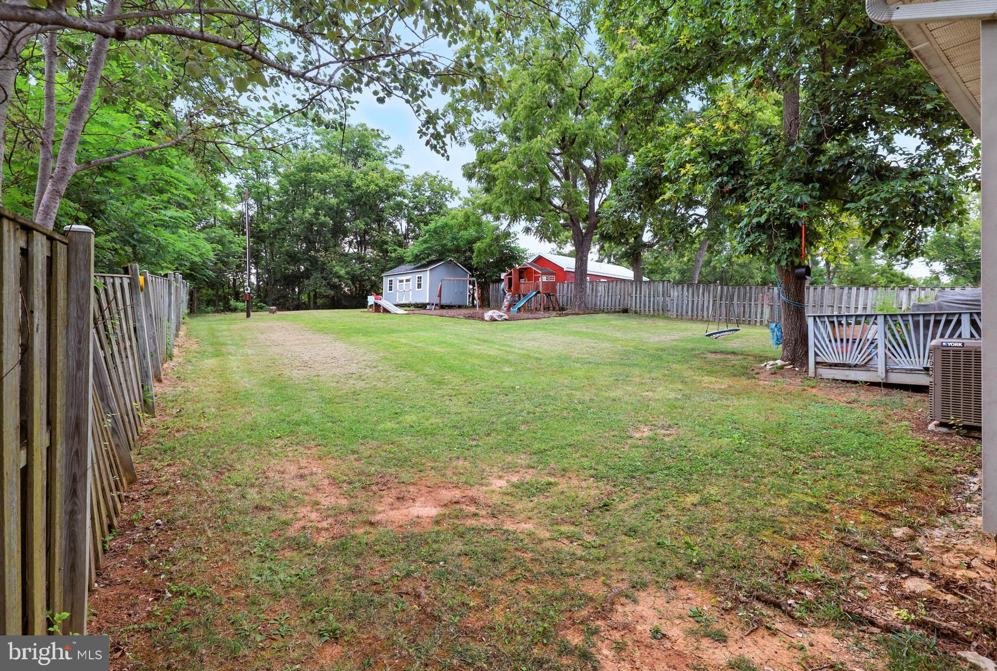 859 Colley Block Road Strasburg, VA 22657 - Photo 3 of 52 a backyard of a house with table and chairs