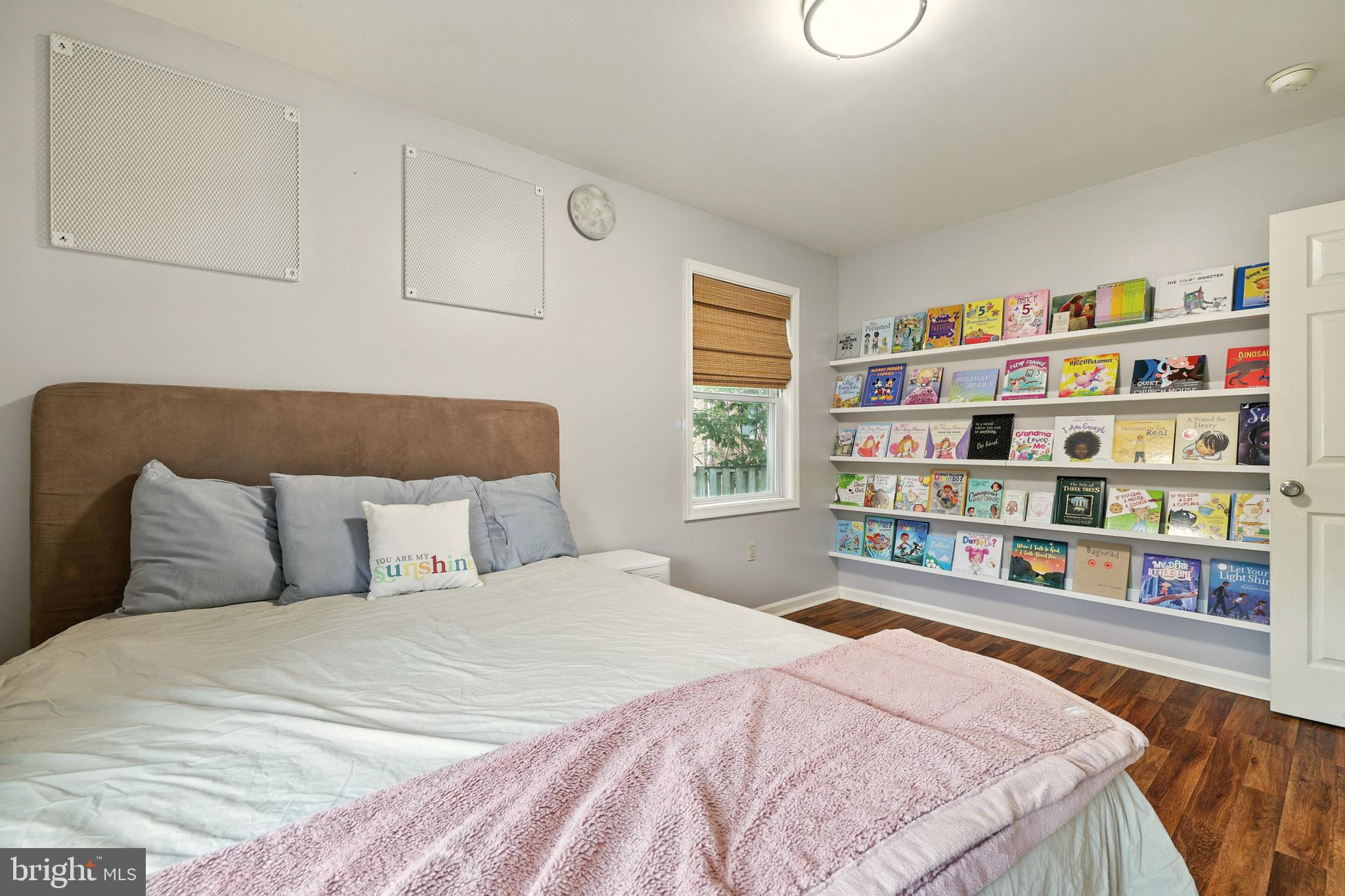 859 Colley Block Road Strasburg, VA 22657 - Photo 31 of 52 a bedroom with a bed and a book shelf