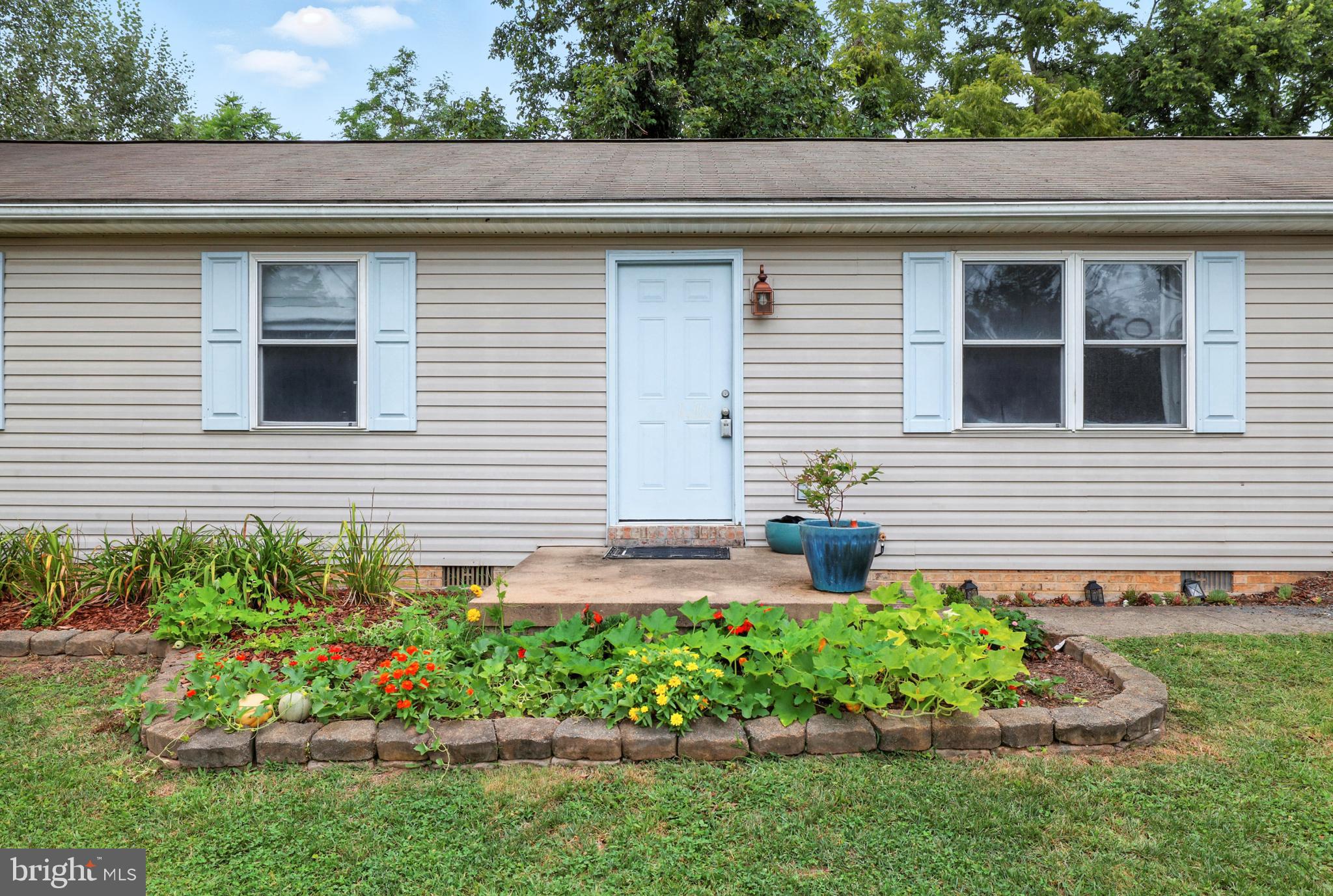 859 Colley Block Road Strasburg, VA 22657 - Photo 40 of 52 a front view of a house with a yard