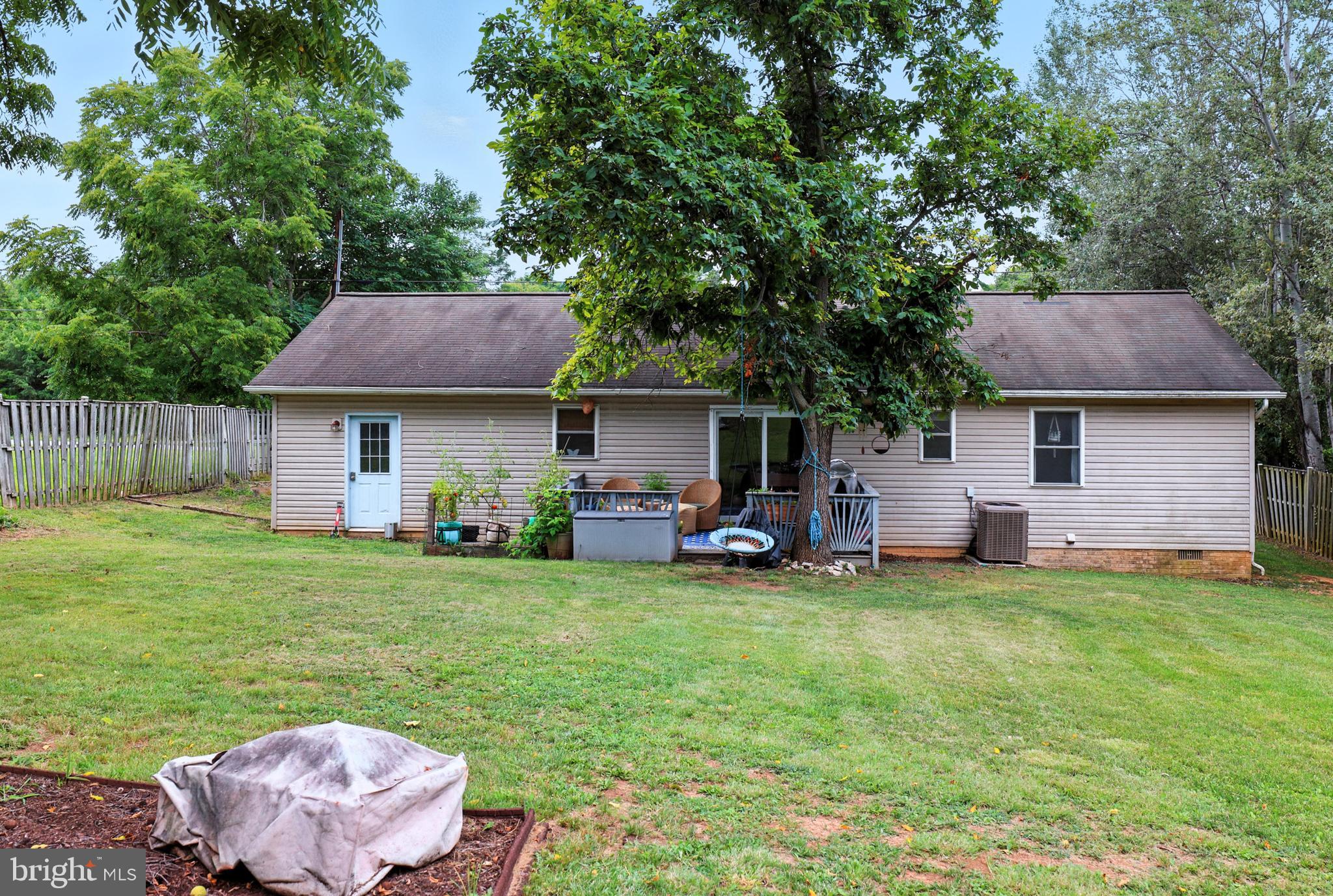 859 Colley Block Road Strasburg, VA 22657 - Photo 43 of 52 a view of a house with a yard and sitting area