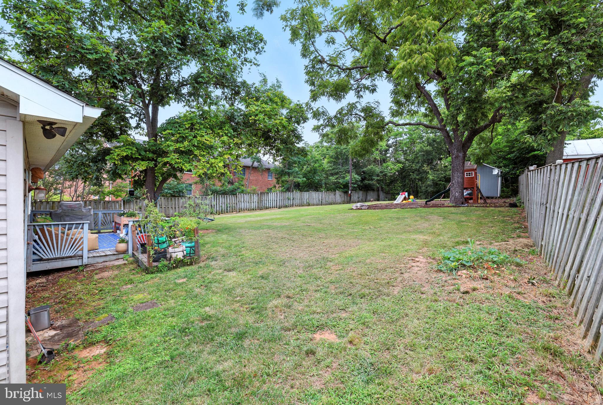 859 Colley Block Road Strasburg, VA 22657 - Photo 49 of 52 a view of a chair and table in backyard of the house
