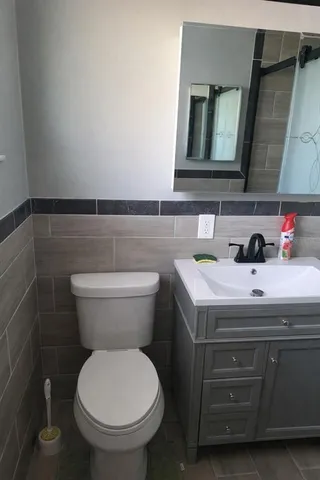a bathroom with a sink and a toilet