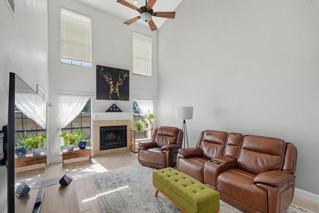 322 West Harwood Road, Unit B Hurst, TX 76054 - Photo 4 of 34 Vaulted ceilings on this 2 story townhome
