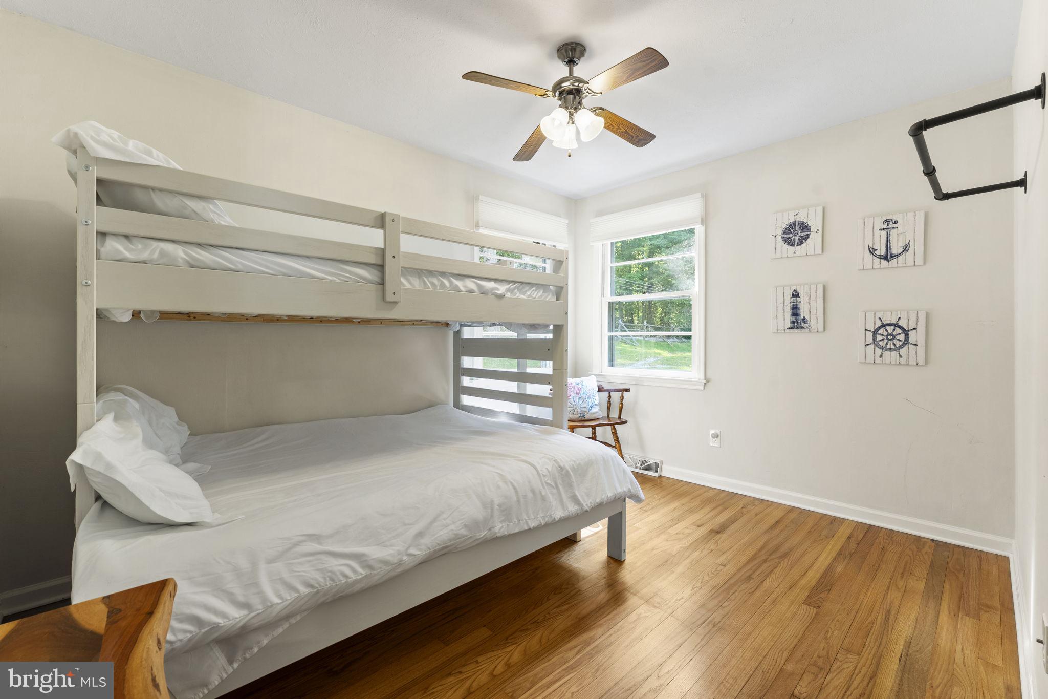 139 Knollwood Road Elkton, MD 21921 - Photo 17 of 57 a bedroom with a bed and a window
