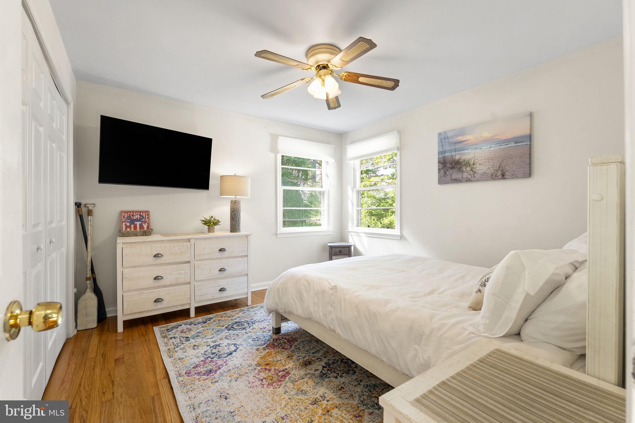 139 Knollwood Road Elkton, MD 21921 - Photo 18 of 57 a bedroom with a bed and a flat screen tv