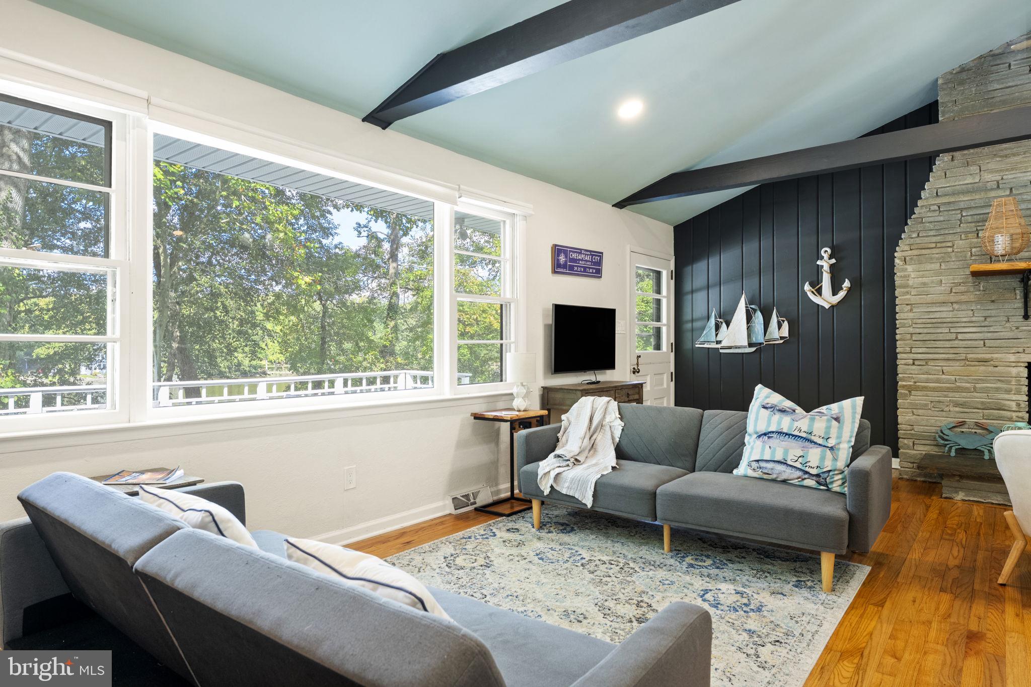139 Knollwood Road Elkton, MD 21921 - Photo 20 of 57 a living room with furniture and a flat screen tv