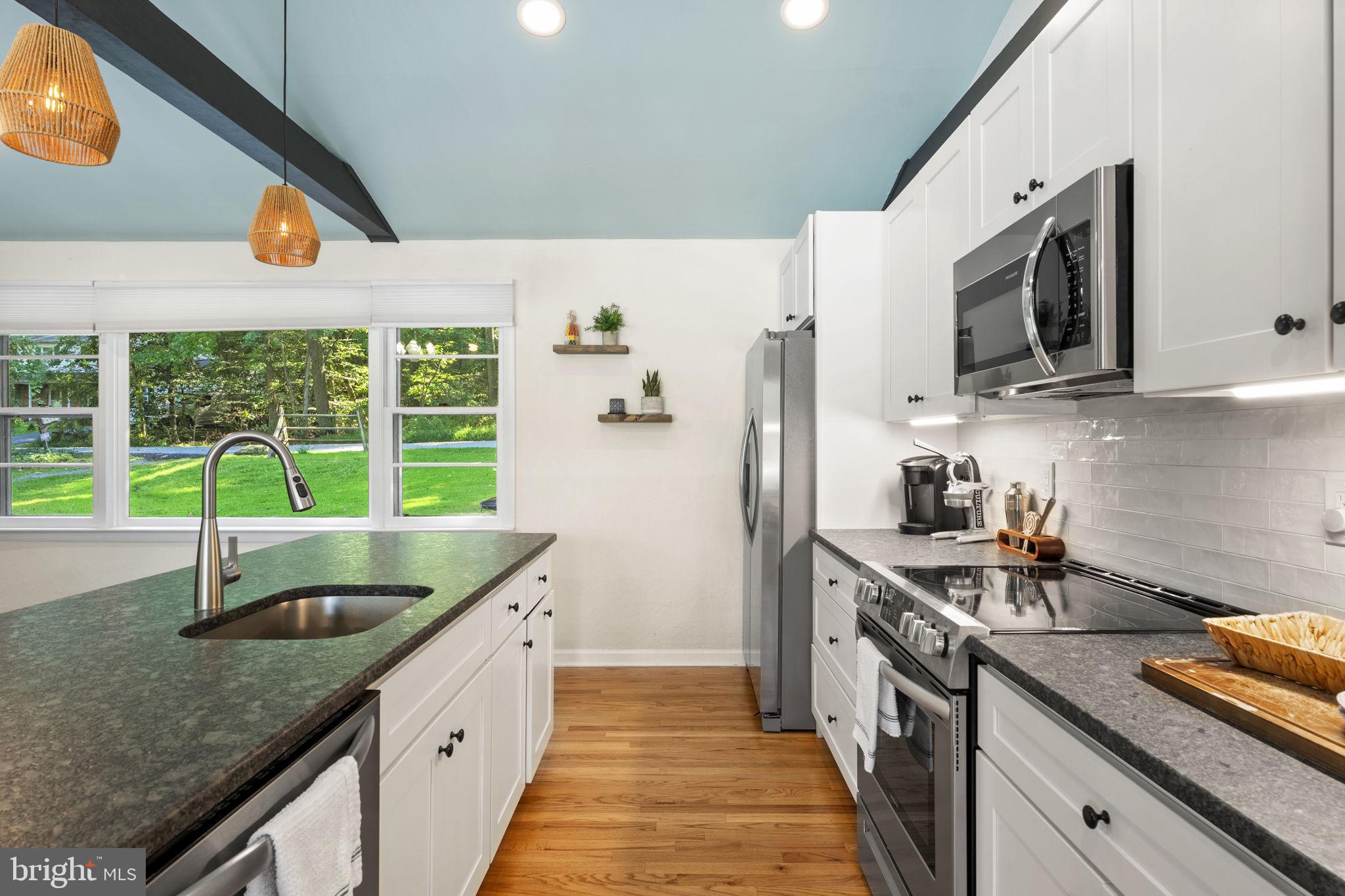 139 Knollwood Road Elkton, MD 21921 - Photo 21 of 57 a kitchen with stainless steel appliances granite countertop a sink and a stove