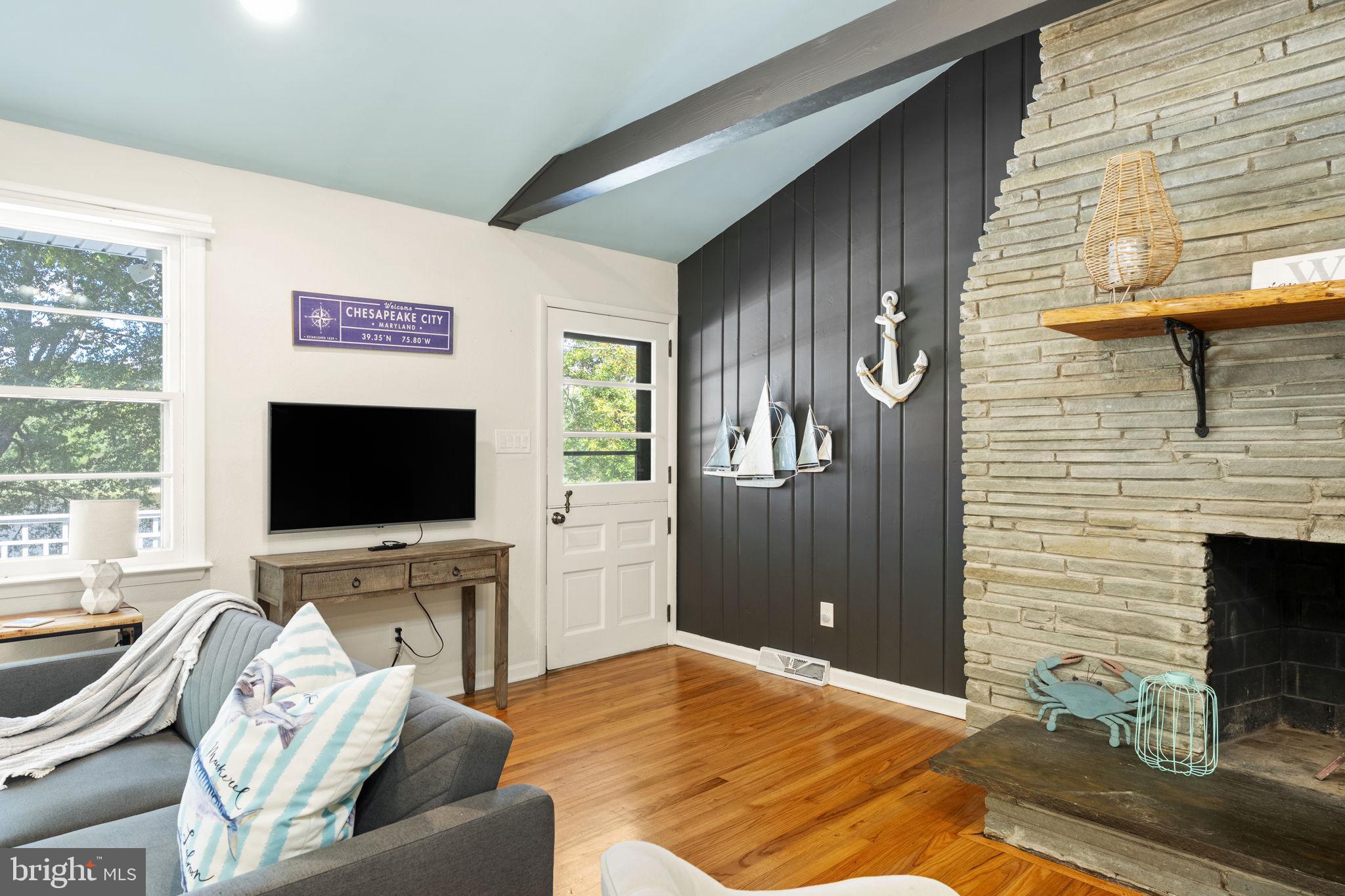 139 Knollwood Road Elkton, MD 21921 - Photo 23 of 57 a living room with furniture and a flat screen tv
