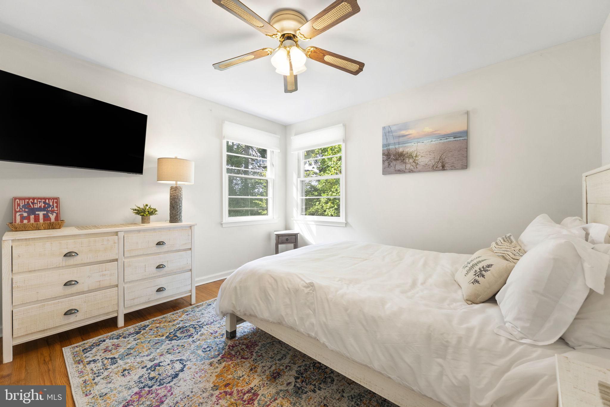 139 Knollwood Road Elkton, MD 21921 - Photo 26 of 57 a bedroom with a bed and a flat screen tv