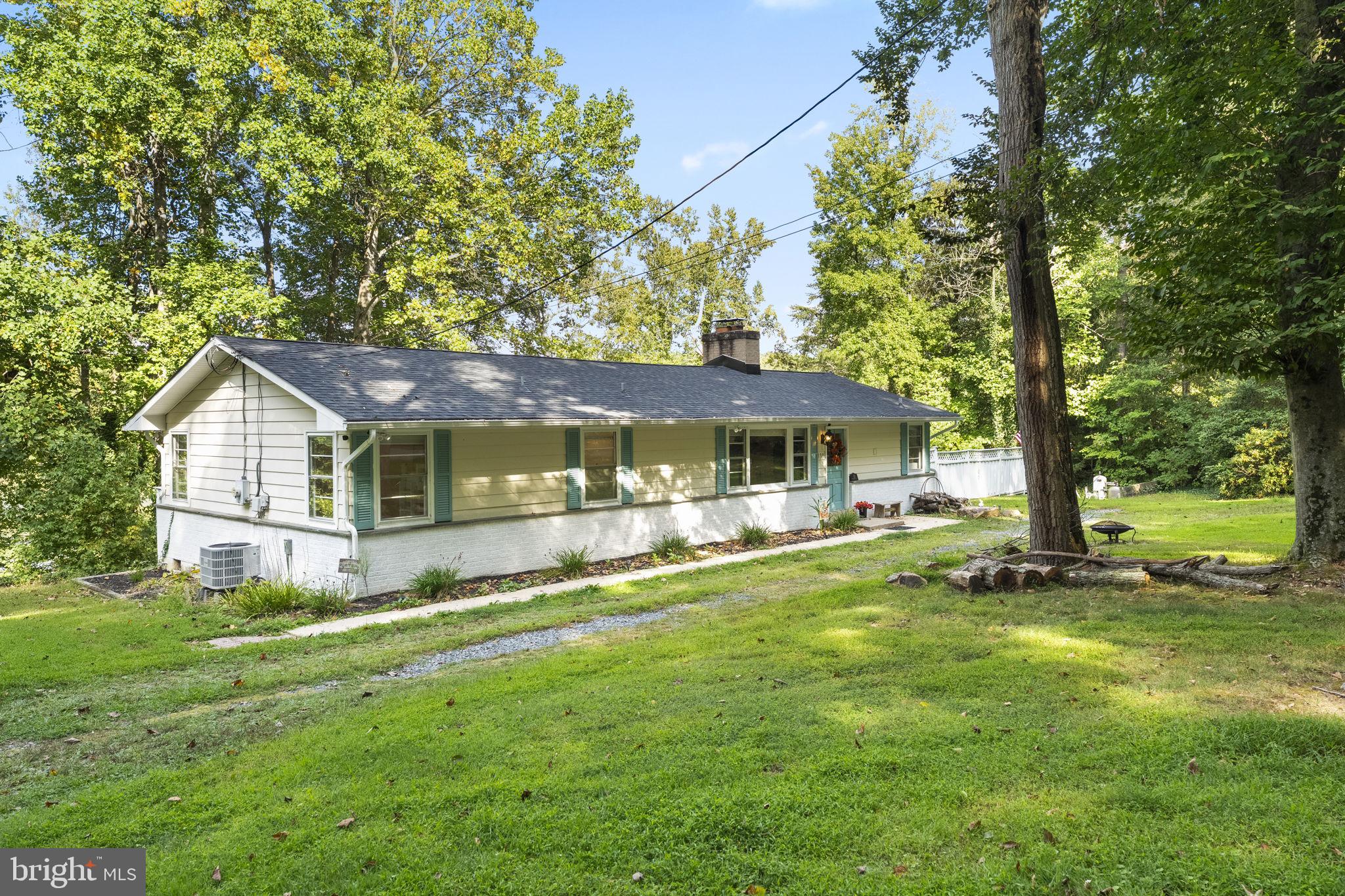 139 Knollwood Road Elkton, MD 21921 - Photo 29 of 57 a front view of a house with yard and green space