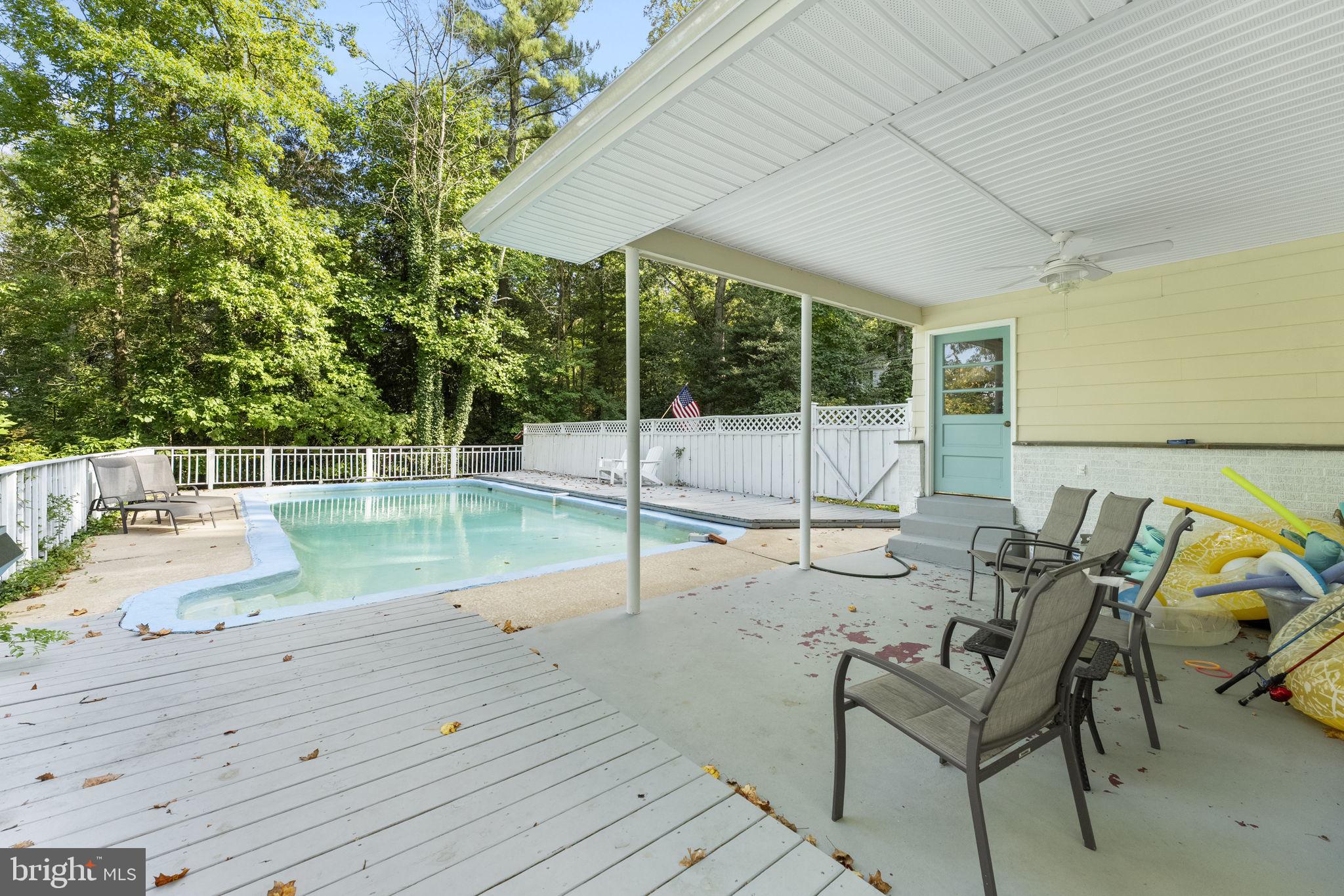 139 Knollwood Road Elkton, MD 21921 - Photo 31 of 57 a view of a swimming pool with a lounge chair