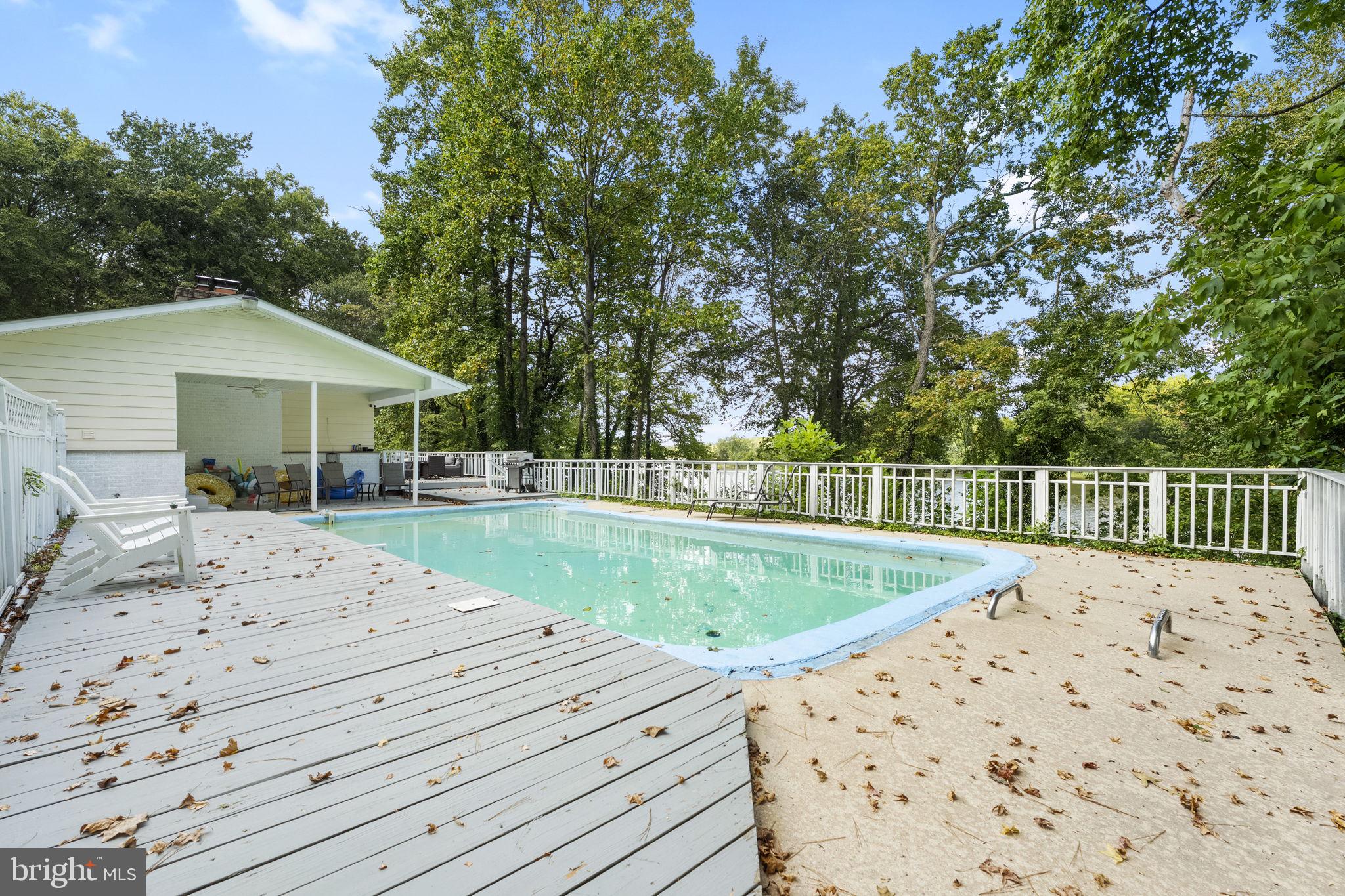 139 Knollwood Road Elkton, MD 21921 - Photo 33 of 57 a view of a backyard with a garden and trees