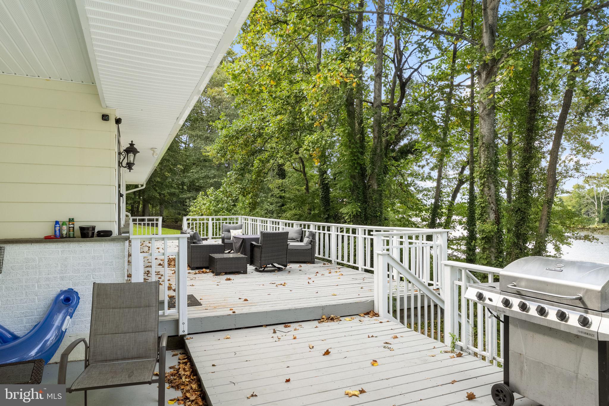 139 Knollwood Road Elkton, MD 21921 - Photo 35 of 57 a view of deck with furniture and trees