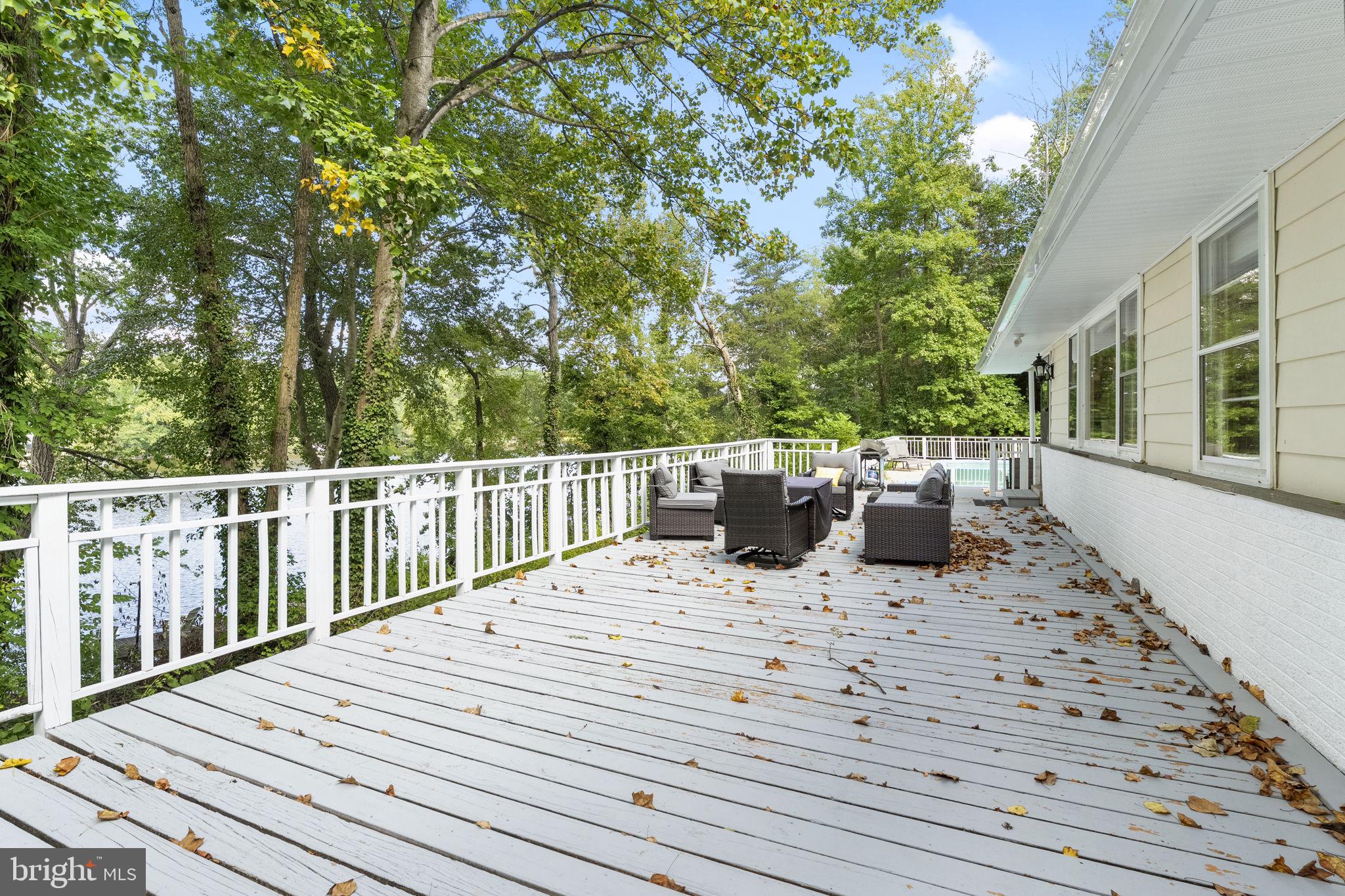 139 Knollwood Road Elkton, MD 21921 - Photo 39 of 57 a view of a deck with furniture and trees