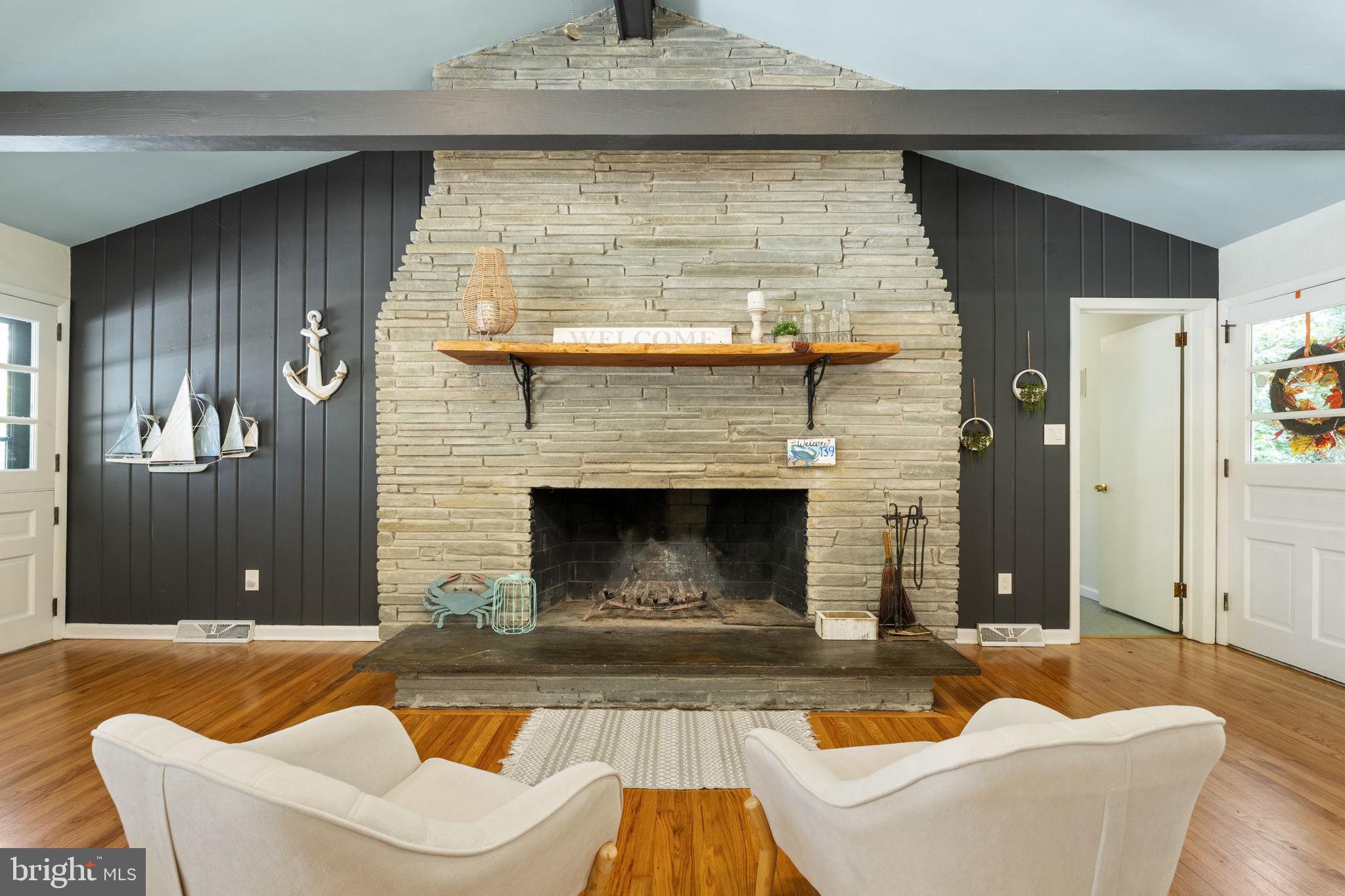 139 Knollwood Road Elkton, MD 21921 - Photo 9 of 57 a living room with furniture and a fireplace