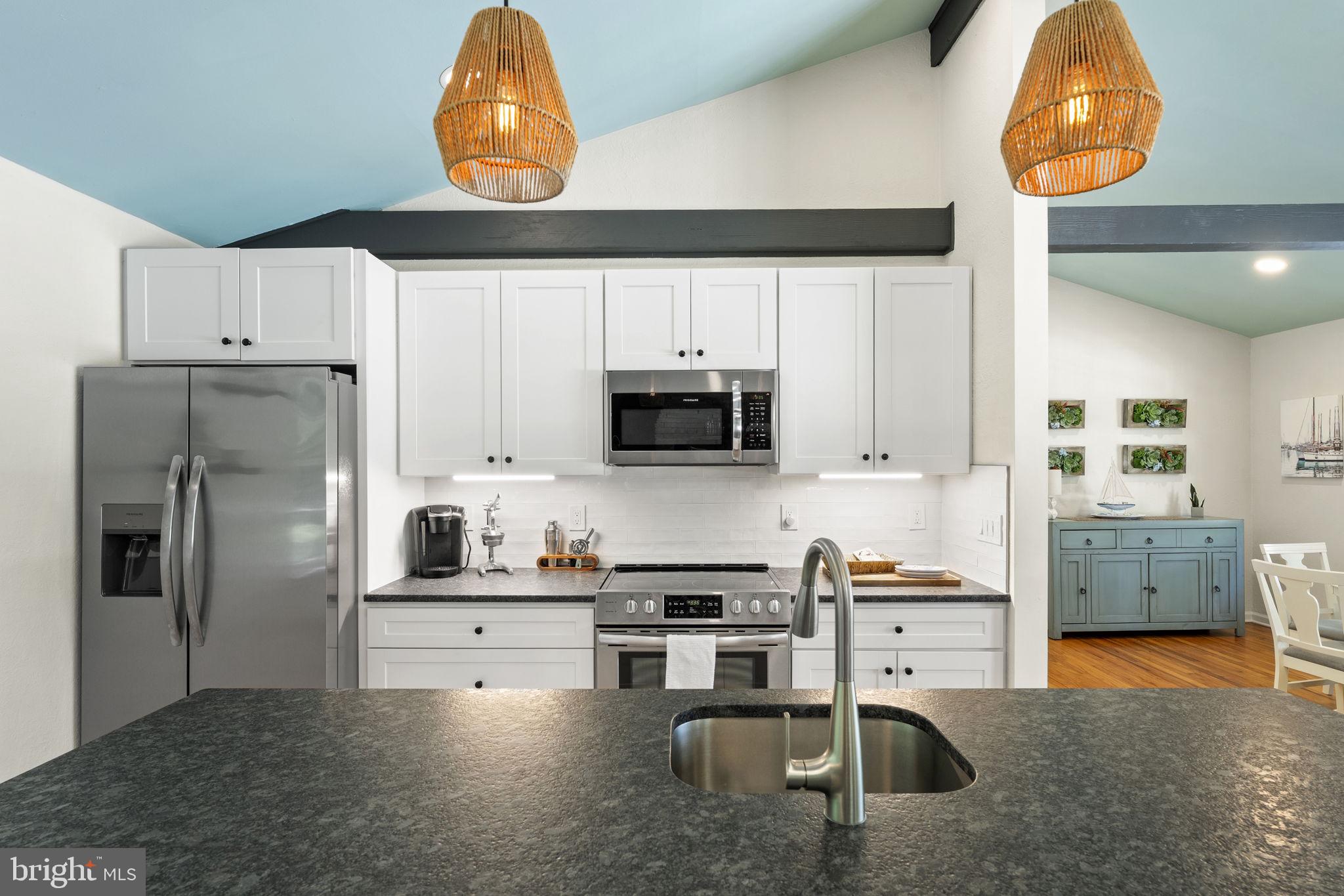 139 Knollwood Road Elkton, MD 21921 - Photo 10 of 57 a kitchen with stainless steel appliances granite countertop a refrigerator and a stove top oven