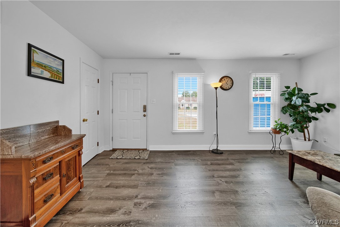 4826 Wilconna Road Chesterfield, VA 23832 - Photo 8 of 22 a view of an empty room with window and wooden floor