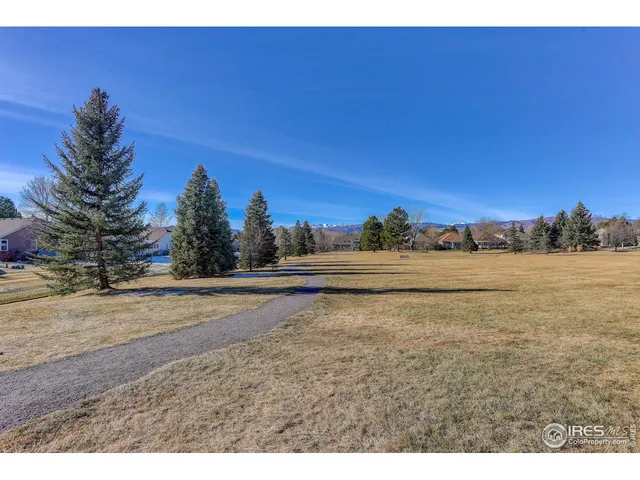 a view of a yard and ocean view