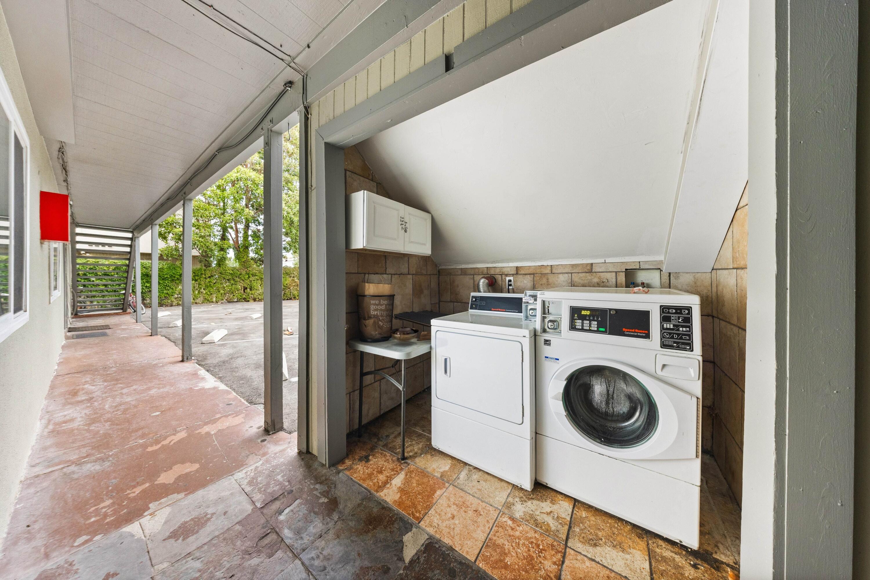6597 Trigo Road Goleta, CA 93117 - Photo 16 of 20 a utility room with dryer and washer
