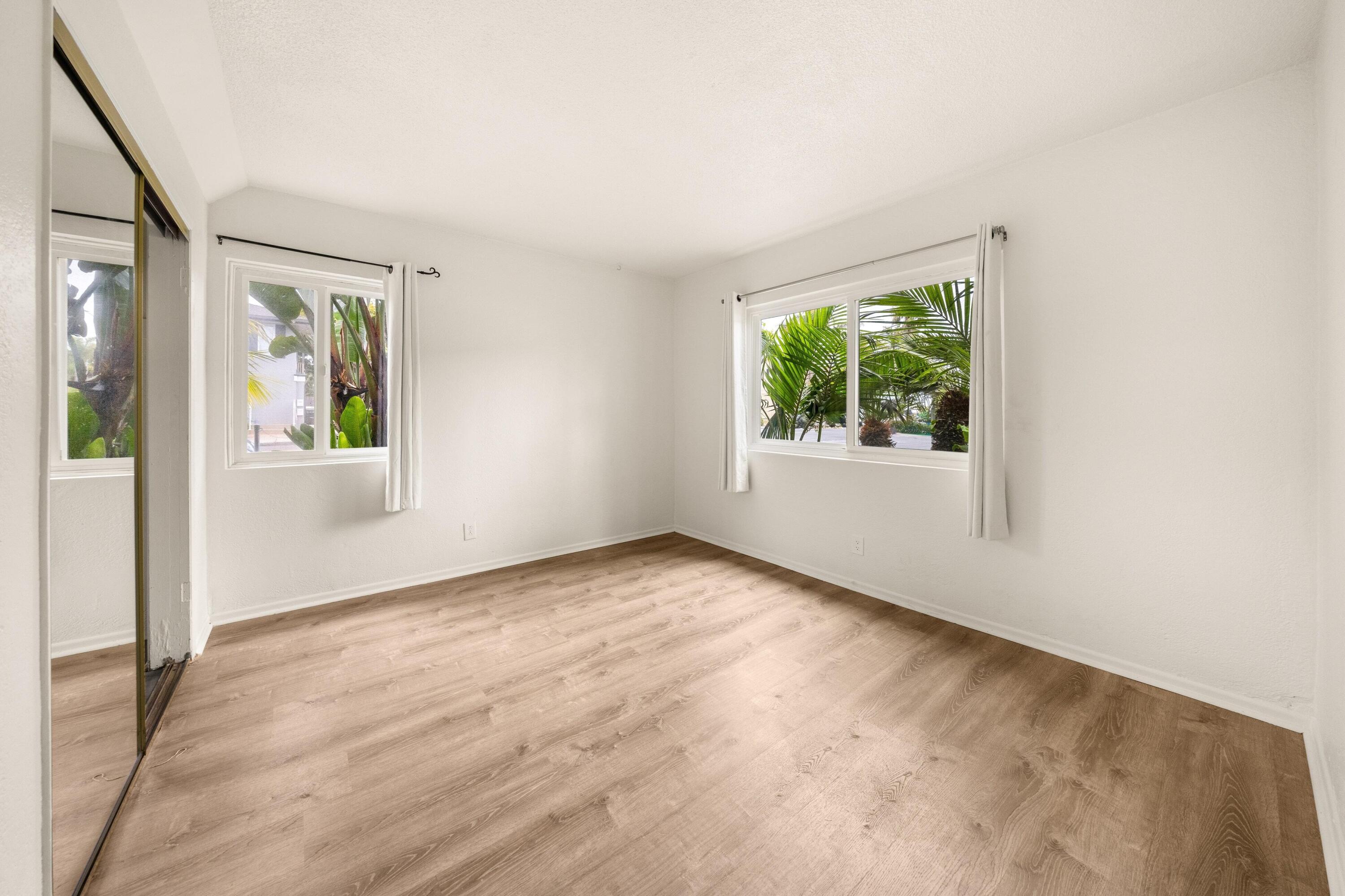 6597 Trigo Road Goleta, CA 93117 - Photo 10 of 20 an empty room with windows