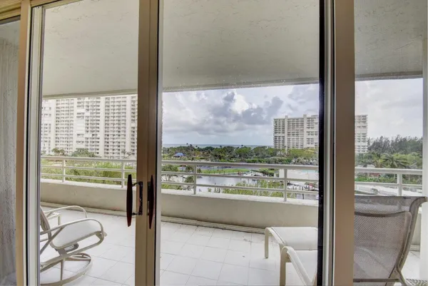 a view of a glass door and porch