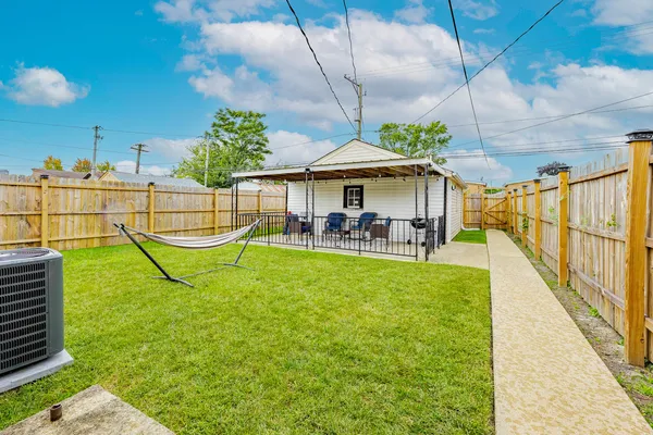a view of a swimming pool with a patio