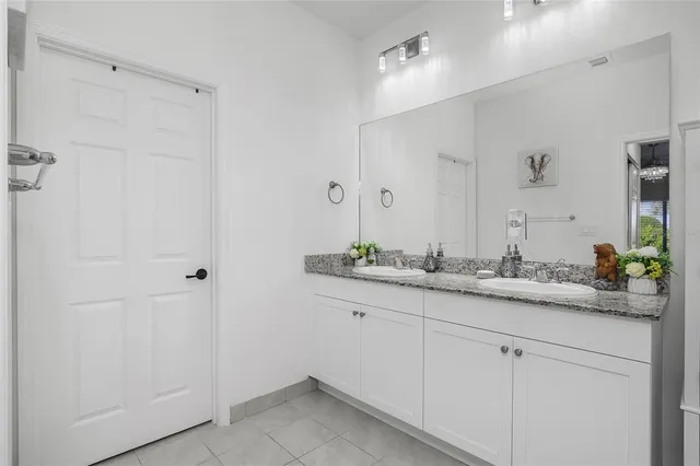 a bedroom with bed and a window