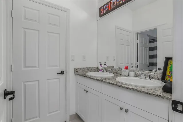 a kitchen with a stove and cabinets