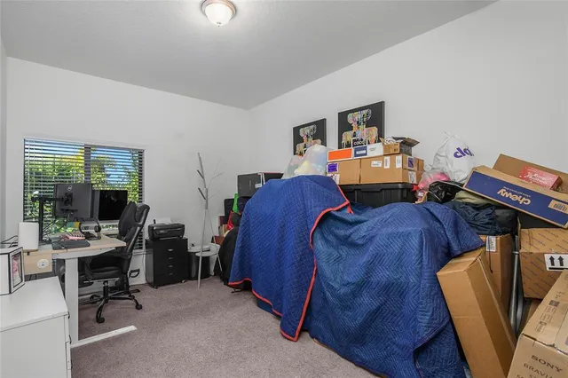 a view of a workspace with furniture