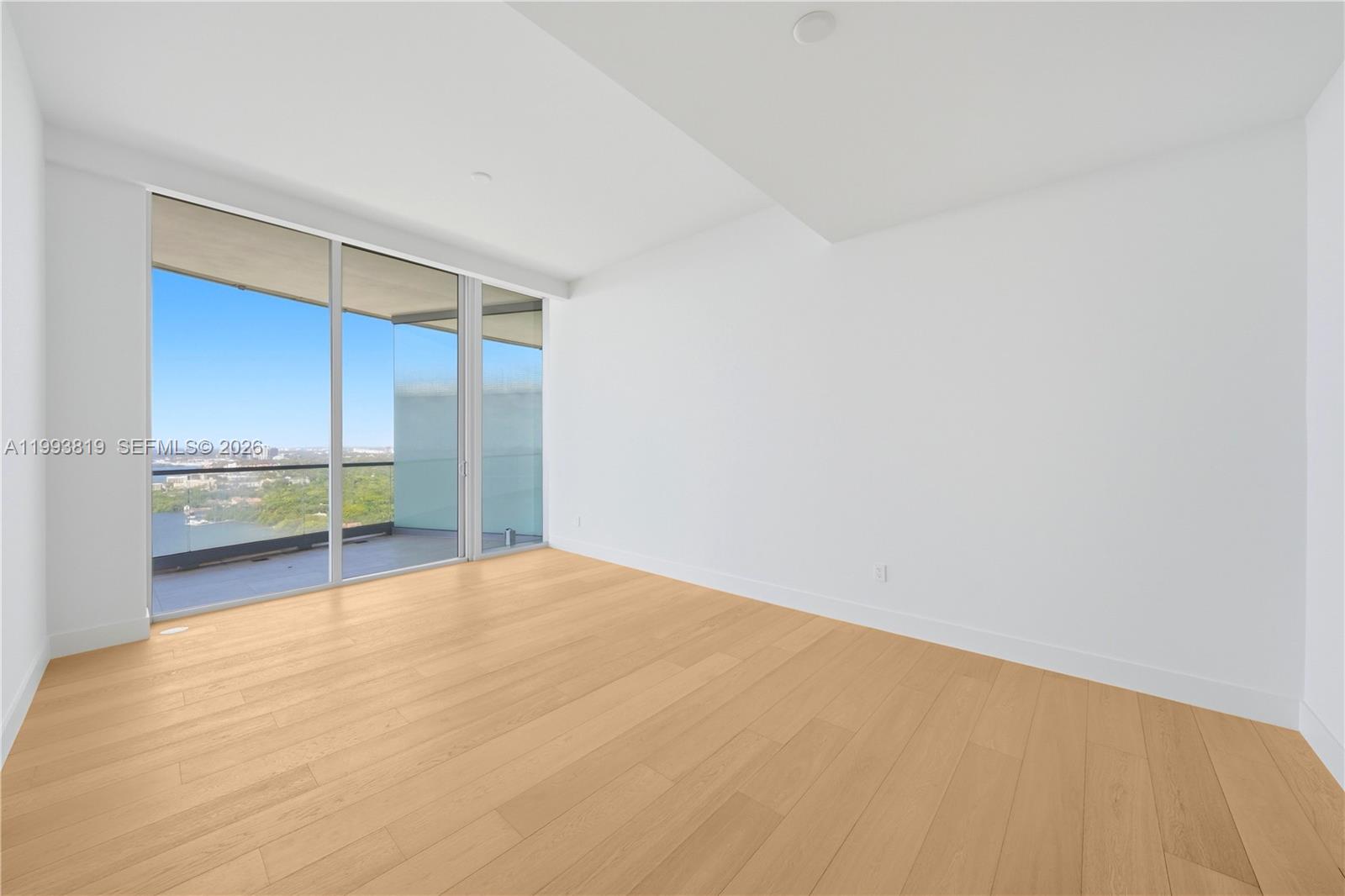 175 Southeast 25th Road, Unit 3102 Miami, FL 33129 - Photo 29 of 65 a view of an empty room with a window