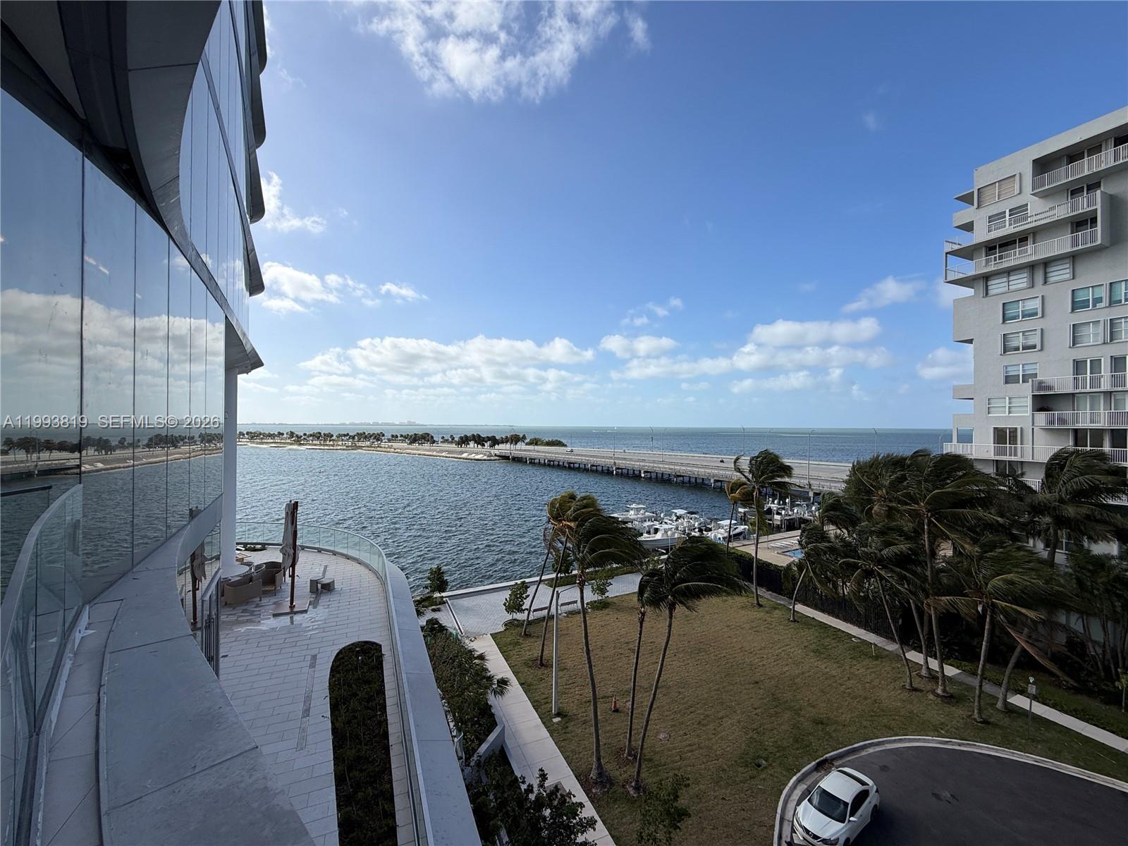 175 Southeast 25th Road, Unit 3102 Miami, FL 33129 - Photo 60 of 65 a view of a lake from a balcony