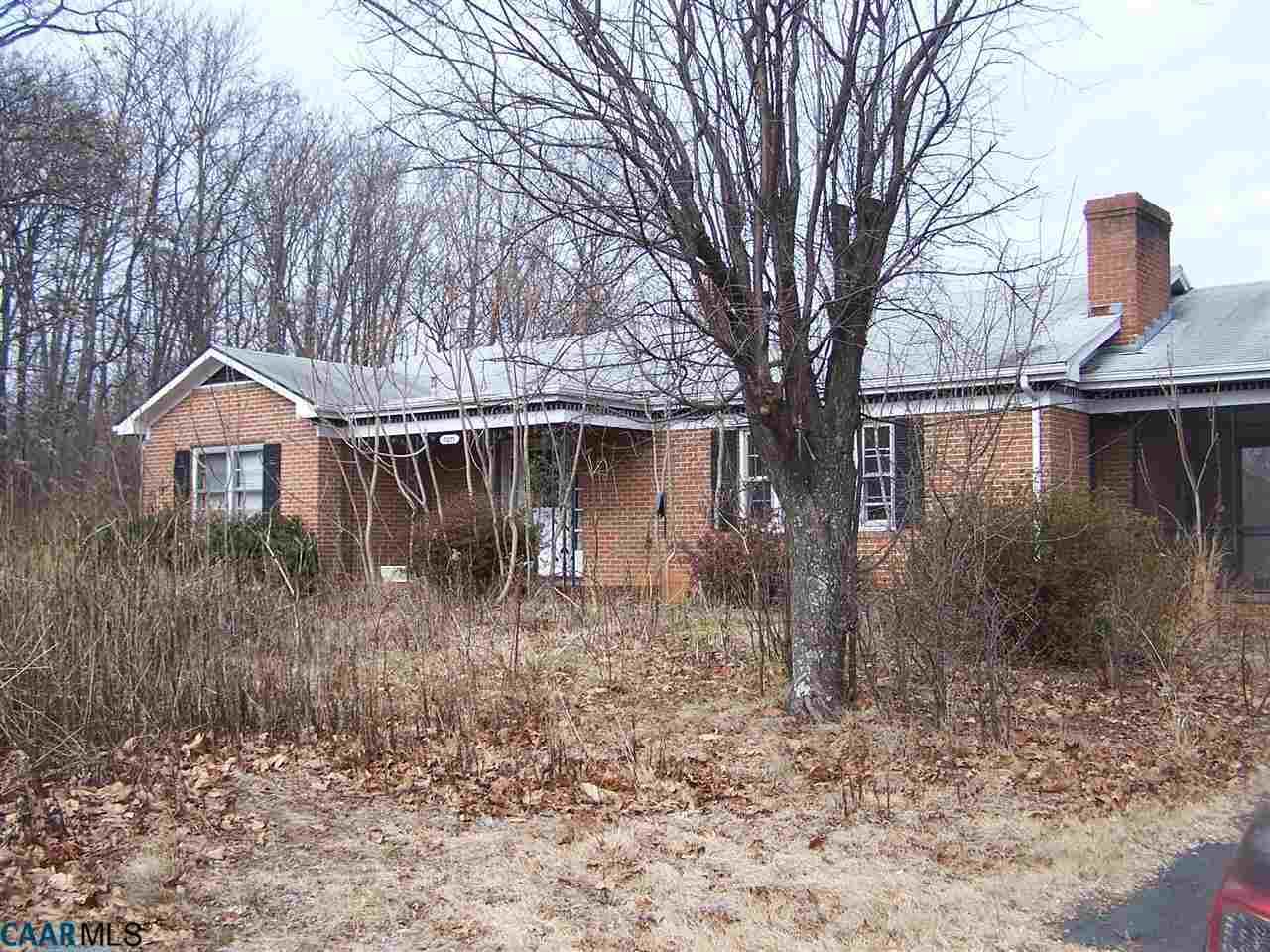 7271 Amicus Road Ruckersville, VA 22968 - Photo 1 of 3 a front view of a house with garden