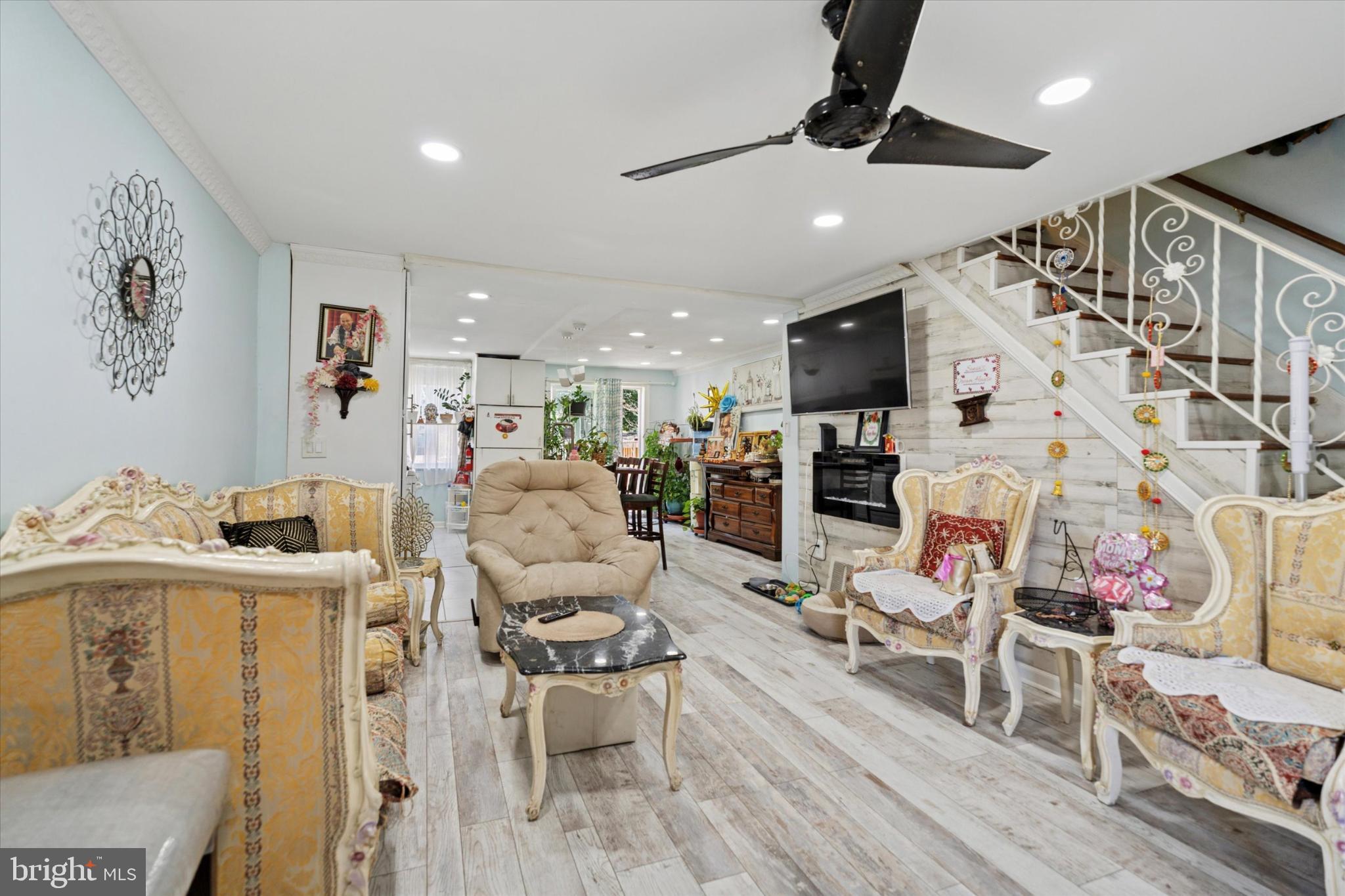 2548 Irvington Road Drexel Hill, PA 19026 - Photo 2 of 15 a living room with furniture and a chandelier