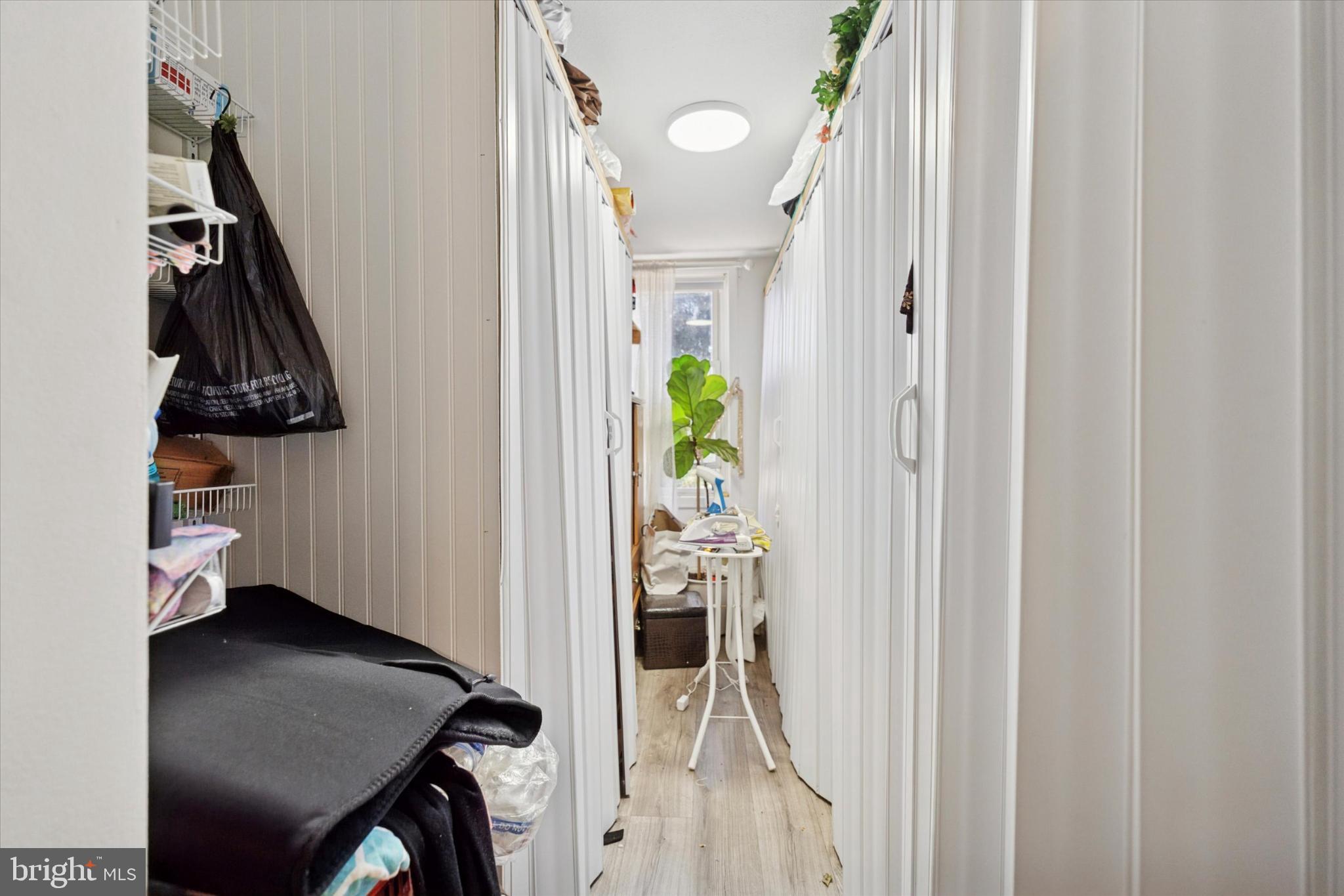 2548 Irvington Road Drexel Hill, PA 19026 - Photo 7 of 15 a view of walk in closet with clothes and shoes