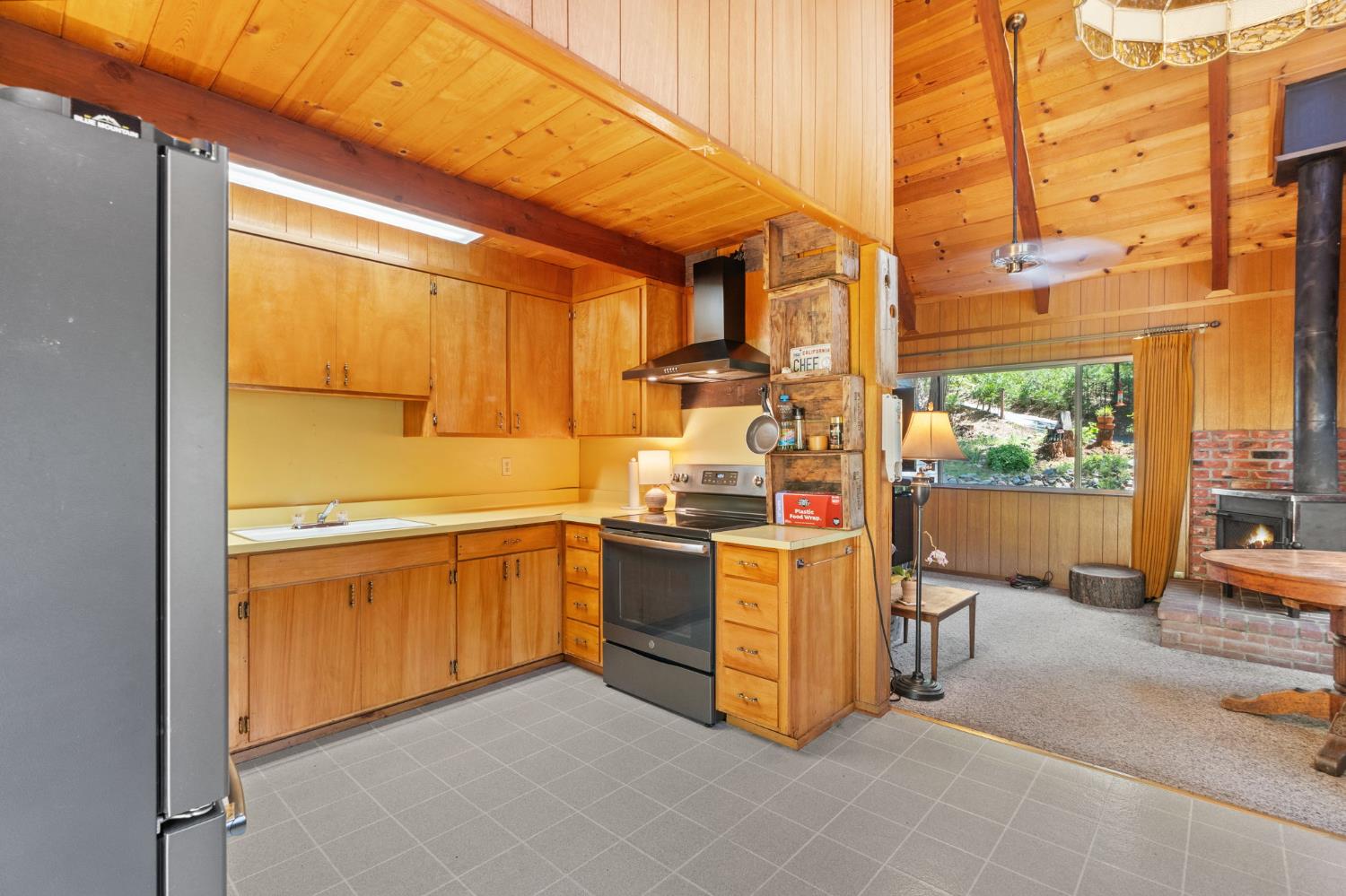 2238 Meadowview Road Arnold, CA 95223 - Photo 9 of 46 Kitchen with access to upper deck