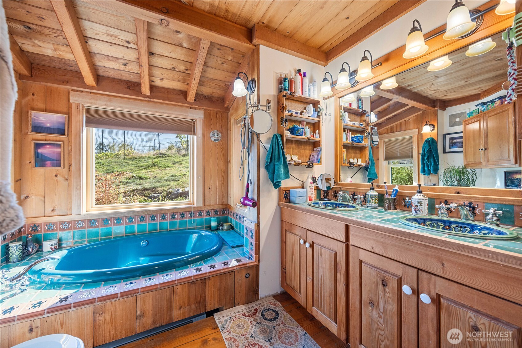 16495 South Lakeshore Road Chelan, WA 98816 - Photo 16 of 40 a view of a kitchen with a large window and a sink