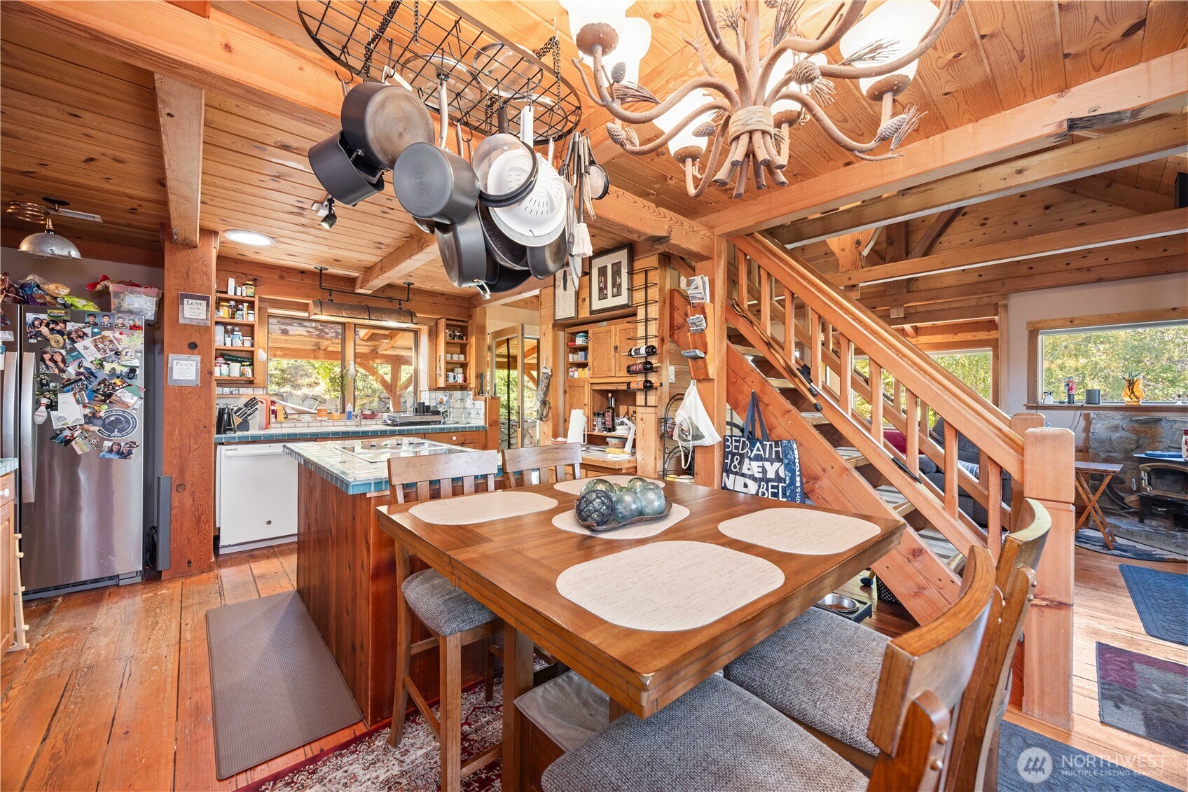 16495 South Lakeshore Road Chelan, WA 98816 - Photo 9 of 40 a roof deck with table and chairs