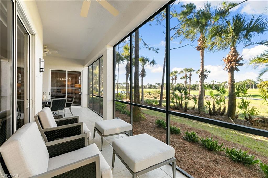 9082 Cascada Way, Unit 9102 Naples, FL 34114 - Photo 23 of 39 a balcony with view of outdoor seating