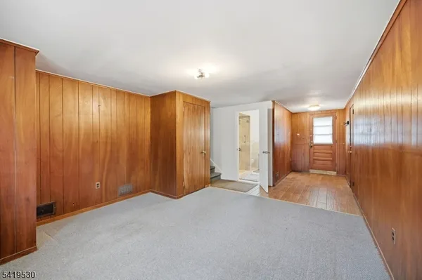 a view of hallway with livingroom