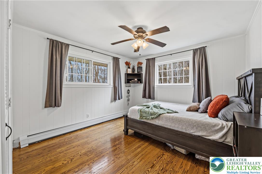7462 Camp Meeting Road New Tripoli, PA 18066 - Photo 14 of 18 a bedroom with a bed and wooden floor