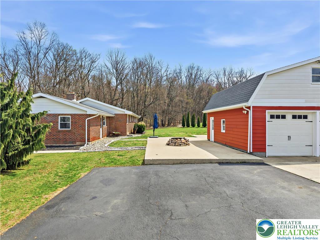 7462 Camp Meeting Road New Tripoli, PA 18066 - Photo 18 of 18 a view of a house with a yard and fence