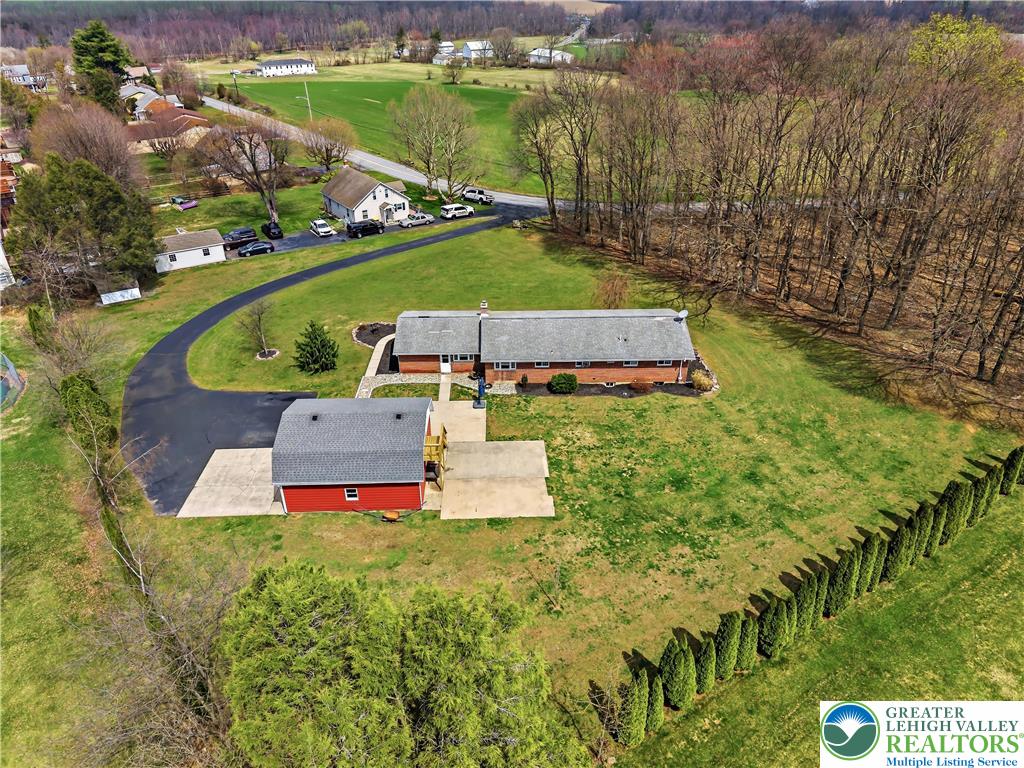 7462 Camp Meeting Road New Tripoli, PA 18066 - Photo 3 of 18 an aerial view of a house with a garden