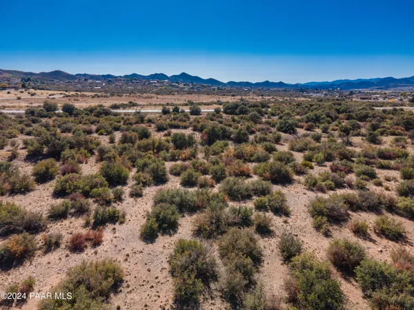 a view of a city with mountains in the background