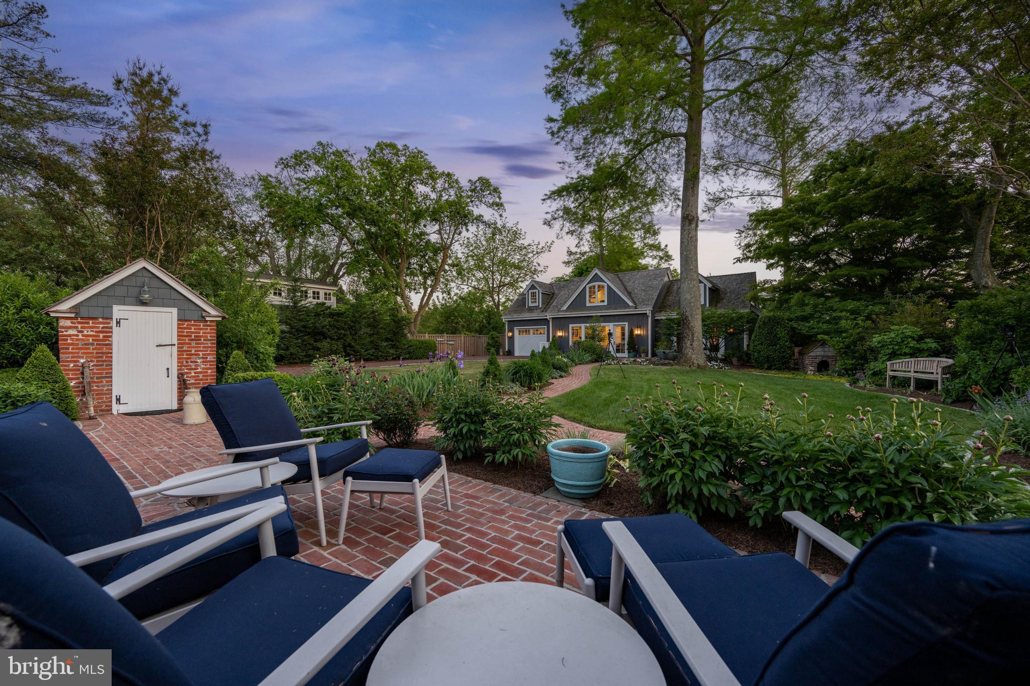410 Pilottown Road Lewes, DE 19958 - Photo 95 of 114 a view of a patio with couches table and chairs and potted plants