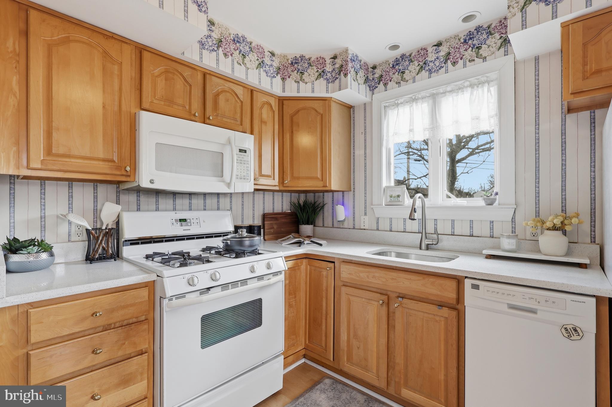 327 South Norristown Road Warminster, PA 18974 - Photo 11 of 32 a kitchen with a sink stove and cabinets