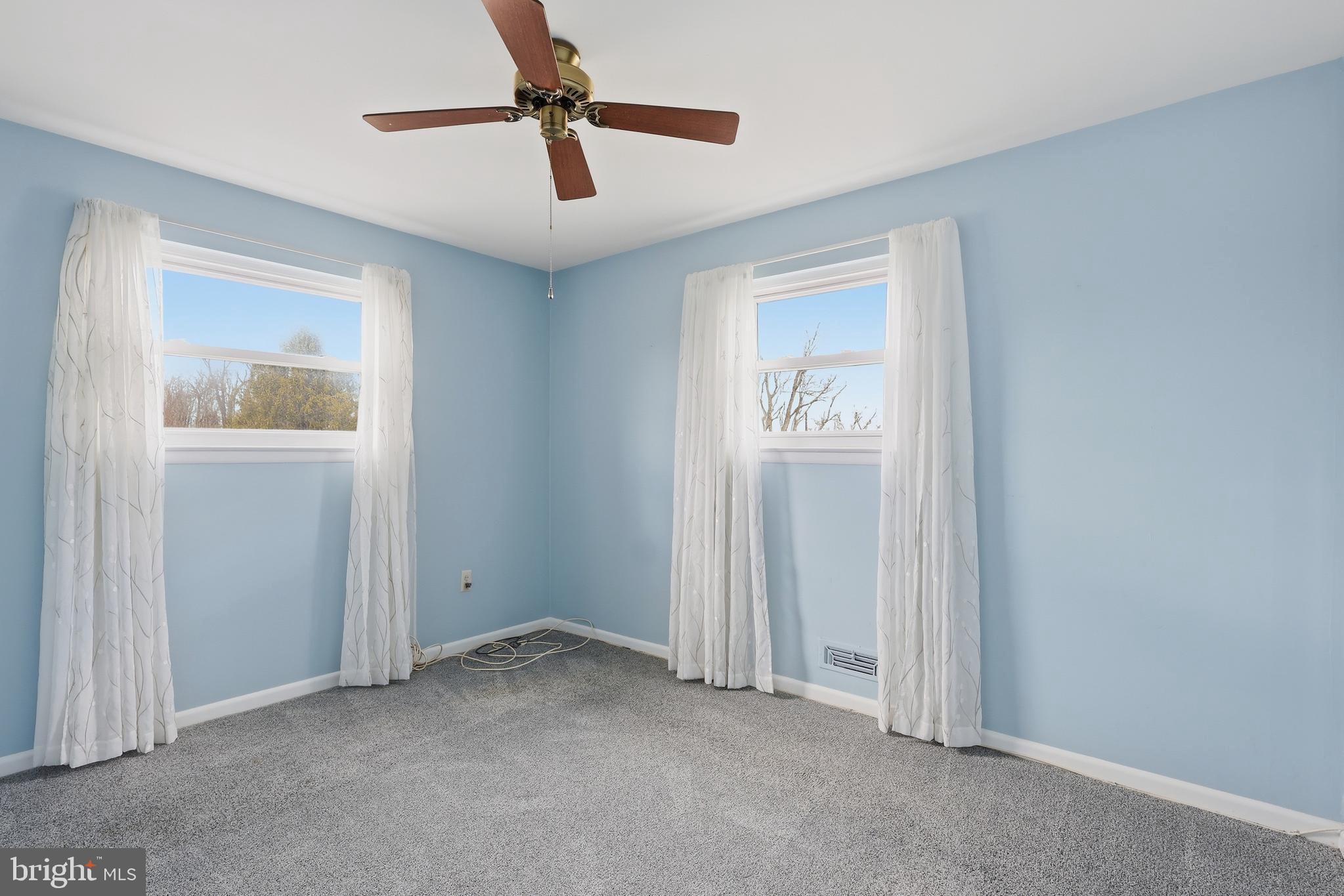 327 South Norristown Road Warminster, PA 18974 - Photo 13 of 32 an empty room with windows and closet