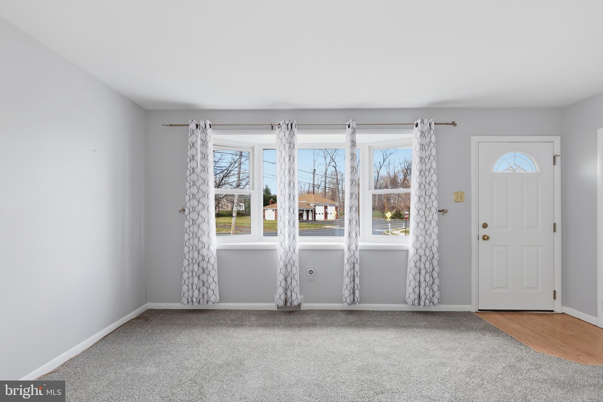 327 South Norristown Road Warminster, PA 18974 - Photo 6 of 32 an empty room with windows