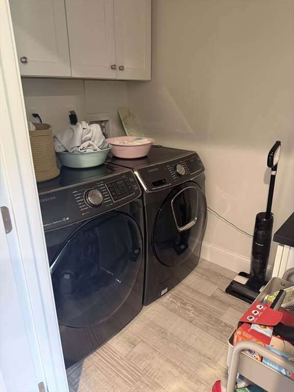 15 Cedar Road Brookline, MA 02467 - Photo 19 of 26 a washing machine sitting inside of a kitchen