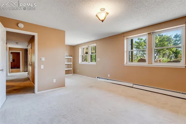 a bathroom with a sink double vanity and a mirror